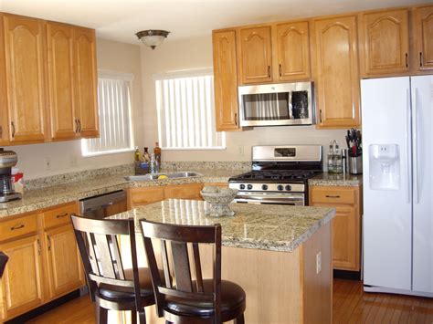 natural maple cabinets with stainless steel appliances|backsplash for maple cabinets.